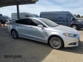 2013 Ford Fusion Titanium Hybrid with VIN 3FA6P0RU9DR303852, listed as a Copart auction lot 50652425 with 98,504 mi miles and Salvage Title. Bid and sale history available at DreamBid. Image 4.