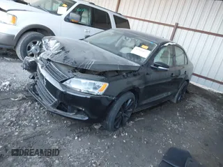 2014 Volkswagen Jetta Sedan SE w/Connectivity with VIN 3VWD07AJ4EM388319, listed as a IAAI auction lot 41246677 with 84,428 mi miles. Bid and sale history available at carsss.com. Image 2.