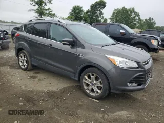2016 Ford Escape Titanium with VIN 1FMCU9J95GUA58624, listed as a Copart auction lot 59915305 with 102,061 mi miles and Salvage title. Bid and sale history available at DreamBid. Image 4.