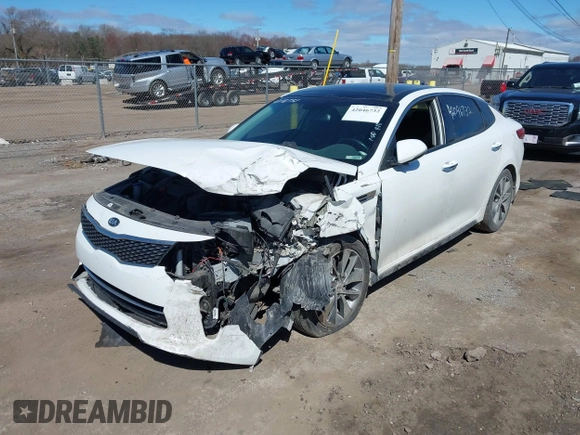 2018 Kia Optima S z VIN 5XXGT4L31JG256876, wystawiony jako IAAI lot #42046732 z przebiegiem 115 746 mil mil oraz . Historia ofert i sprzedaży dostępna na DreamBid. Obrazek 2.