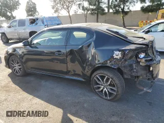 2016 Scion tC with VIN JTKJF5C79GJ020110, listed as a Copart auction lot 86995214 with 79,165 mi miles and Salvage Title. Bid and sale history available at carsss.com. Image 2.