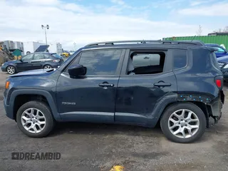 2015 Jeep Renegade Latitude with VIN ZACCJBBT0FPB73676, listed as a IAAI auction lot 42032879 with 121,953 mi miles. Bid and sale history available at carsss.com. Image 14.