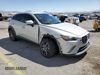 2018 Mazda CX-3 Touring z VIN JM1DKFC74J0312864, wystawiony jako Copart lot #55862845 z przebiegiem 75 584 mil mil oraz Szkoda całkowita • Salvage title. Historia ofert i sprzedaży dostępna na DreamBid. Obrazek 4.