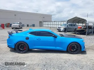 2022 Chevrolet Camaro ZL1 z VIN 1G1FJ1R62N0118359, wystawiony jako IAAI lot #42146460 z przebiegiem 25 274 mil mil oraz . Historia ofert i sprzedaży dostępna na DreamBid. Obrazek 14.