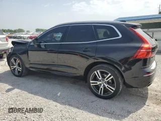 2018 Volvo XC60 Momentum with VIN LYV102RK6JB083622, listed as a Copart auction lot 56909505 with 89,197 mi miles and Salvage title. Bid and sale history available at DreamBid. Image 2.