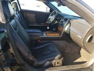 2009 Cadillac XLR Platinum z VIN 1G6YV36A395600052, wystawiony jako Copart lot #76961534 z przebiegiem 176 354 mil mil oraz Szkody całkowita. Historia ofert i sprzedaży dostępna na DreamBid. Obrazek 10.