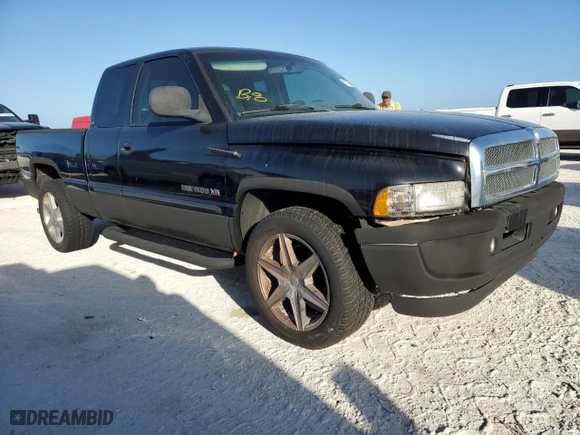 2000 Dodge Ram 1500 with VIN 1B7HC13Z7YJ122323, listed as a Copart auction lot 77254054 with 0 mi miles and Non Repairable. Bid and sale history available at carsss.com. Image 4.