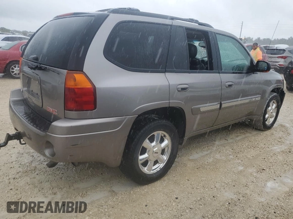 2005 GMC Envoy SLT with VIN 1GKDT13S452307702, listed as a Copart auction lot 74204644 with 0 mi miles and Salvage Title. Bid and sale history available at carsss.com. Image 3.