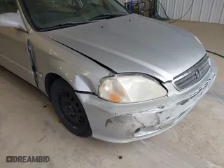 1999 Honda Civic EX with VIN 1HGEJ8640XL013417, listed as a IAAI auction lot 41915827 with 257,696 mi miles. Bid and sale history available at carsss.com. Image 6.