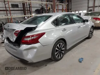 2018 Nissan Altima SR with VIN 1N4AL3AP0JC266584, listed as a IAAI auction lot 41900484 with 136,223 mi miles and . Bid and sale history available at carsss.com. Image 4.