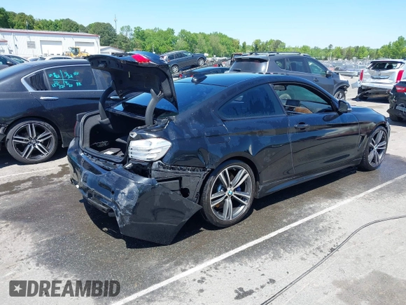 2015 BMW 4 Series 435i with VIN WBA3R1C56FK194060, listed as a IAAI auction lot 42061619 with 153,384 mi miles and . Bid and sale history available at DreamBid. Image 4.