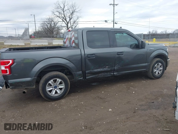 2019 Ford F-150 XL with VIN 1FTEW1CBXKFC64236, listed as a IAAI auction lot 41531279 with 102,965 mi miles and . Bid and sale history available at carsss.com. Image 13.