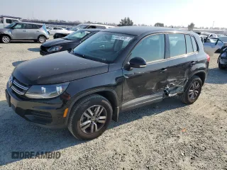 2014 Volkswagen Tiguan SE z VIN WVGAV3AX3EW512497, wystawiony jako Copart lot #43221255 z przebiegiem 94 633 mil mil oraz Szkoda całkowita • Salvage title. Historia ofert i sprzedaży dostępna na DreamBid. Obrazek 1.
