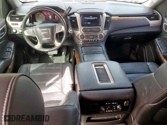 2015 GMC Yukon Denali with VIN 1GKS2CKJ2FR580533, listed as a Copart auction lot 48455205 with 147,532 mi miles and Salvage Title. Bid and sale history available at carsss.com. Image 8.