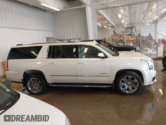 2015 GMC Yukon XL Denali with VIN 1GKS2JKJXFR528927, listed as a IAAI auction lot 41391259 with 159,467 mi miles. Bid and sale history available at carsss.com. Image 13.