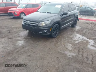 2012 Volkswagen Tiguan SE with VIN WVGAV7AX0CW602713, listed as a IAAI auction lot 41558520 with 95,678 mi miles and . Bid and sale history available at DreamBid. Image 17.