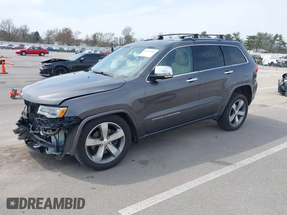 2014 Jeep Grand Cherokee Overland with VIN 1C4RJFCT6EC187098, listed as a IAAI auction lot 42077453 with 172,220 mi miles and . Bid and sale history available at DreamBid. Image 18.