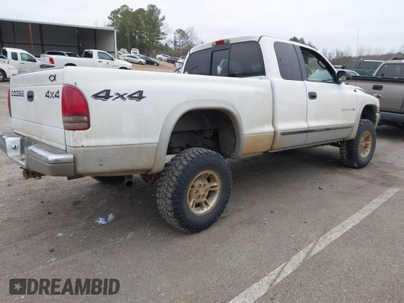1999 Dodge Dakota SLT with VIN 1B7GG22X3XS223969, listed as a IAAI auction lot 41329085 with 185,859 mi miles and . Bid and sale history available at carsss.com. Image 4.