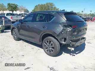 2018 Mazda CX-5 Grand Touring with VIN JM3KFBDM8J0314925, listed as a IAAI auction lot 41825917 with 70,027 mi miles. Bid and sale history available at carsss.com. Image 3.