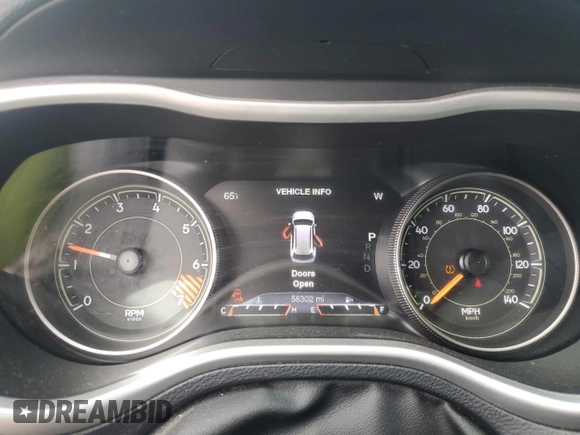 2015 Jeep Cherokee Trailhawk with VIN 1C4PJMBB1FW630715, listed as a Copart auction lot 58559675 with 58,302 mi miles and Salvage title. Bid and sale history available at DreamBid. Image 9.