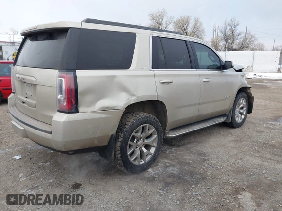 2015 GMC Yukon SLT z VIN 1GKS2BKC6FR655777, wystawiony jako IAAI lot #40982330 z przebiegiem 120 627 mil mil oraz . Historia ofert i sprzedaży dostępna na DreamBid. Obrazek 4.