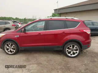 2015 Ford Escape Titanium with VIN 1FMCU9J96FUC02177, listed as a IAAI auction lot 42312928 with 100,716 mi miles and . Bid and sale history available at DreamBid. Image 14.