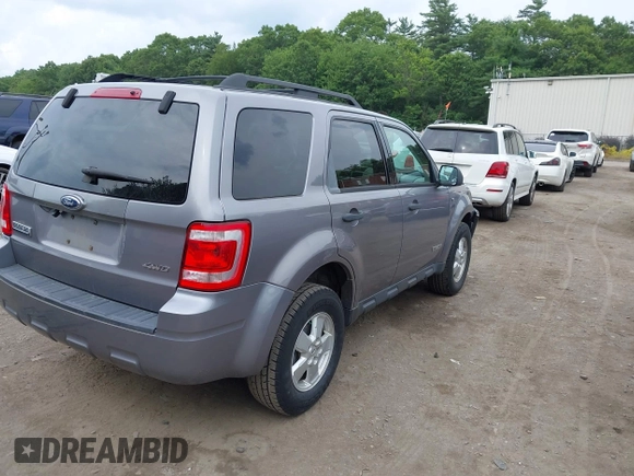 2008 Ford Escape XLT with VIN 1FMCU93108KE75766, listed as a IAAI auction lot 42595254 with 165,436 mi miles and . Bid and sale history available at DreamBid. Image 4.