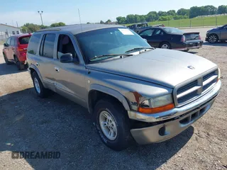 2000 Dodge Durango z VIN 1B4HS28Z3YF301850, wystawiony jako IAAI lot #42743108 z przebiegiem 170 690 mil mil oraz . Historia ofert i sprzedaży dostępna na DreamBid. Obrazek 1.