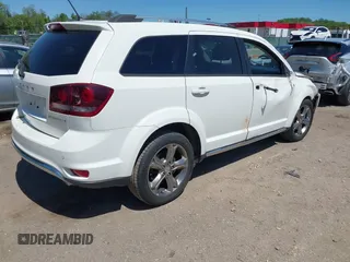2016 Dodge Journey Crossroad Plus z VIN 3C4PDCGG4GT154134, wystawiony jako IAAI lot #42124659 z przebiegiem 101 700 mil mil oraz . Historia ofert i sprzedaży dostępna na DreamBid. Obrazek 4.