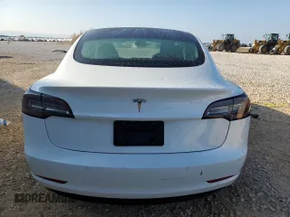 2022 Tesla Model 3 with VIN 5YJ3E1EA7NF184741, listed as a Copart auction lot 82487494 with 133,215 mi miles and Clean Title. Bid and sale history available at DreamBid. Image 6.
