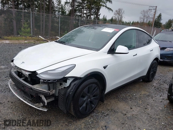 2025 Tesla Model Y Long Range with VIN 7SAYGDEDXSF248734, listed as a IAAI auction lot 41719195 with 5,876 mi miles and . Bid and sale history available at DreamBid. Image 14.