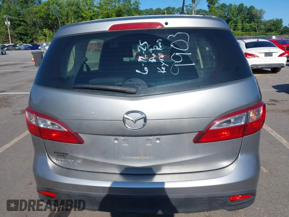 2012 Mazda 5 Sport with VIN JM1CW2BLXC0129303, listed as a IAAI auction lot 42556899 with 200,863 mi miles and . Bid and sale history available at DreamBid. Image 17.