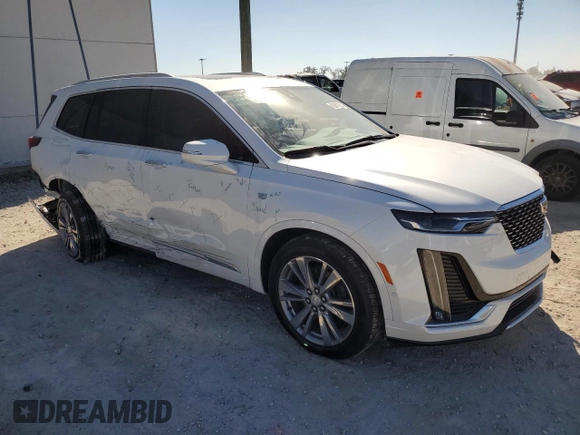 2024 Cadillac XT6 FWD Premium Luxury with VIN 1GYKPCRS4RZ742995, listed as a Copart auction lot 82802774 with 5,898 mi miles and Salvage Title. Bid and sale history available at carsss.com. Image 4.