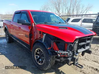 2016 Ram 1500 Rebel z VIN 1C6RR7YT2GS114835, wystawiony jako IAAI lot #42042738 z przebiegiem 81 190 mil mil oraz . Historia ofert i sprzedaży dostępna na DreamBid. Obrazek 1.