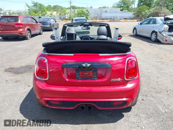 2017 MINI Convertible Cooper S with VIN WMWWG9C53H3C22950, listed as a IAAI auction lot 42297714 with 22,613 mi miles and . Bid and sale history available at DreamBid. Image 16.