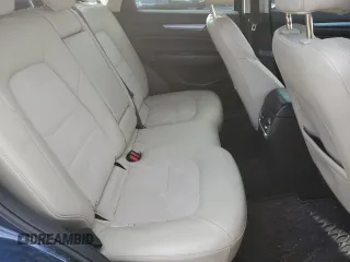 2017 Mazda CX-5 Touring z VIN JM3KFBCL7H0212955, wystawiony jako Copart lot #46096525 z przebiegiem 94 606 mil mil oraz Szkody całkowita. Historia ofert i sprzedaży dostępna na DreamBid. Obrazek 10.