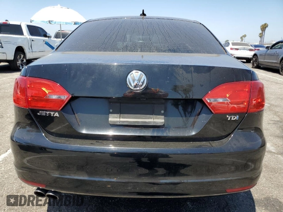 2014 Volkswagen Jetta TDI w/Premium with VIN 3VWLL7AJ8EM367587, listed as a Copart auction lot 63670815 with 129,289 mi miles and Clean title. Bid and sale history available at DreamBid. Image 6.