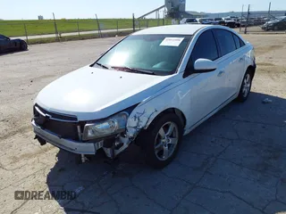 2014 Chevrolet Cruze 1LT with VIN 1G1PC5SB0E7261699, listed as a IAAI auction lot 42011008 with 164,699 mi miles and . Bid and sale history available at DreamBid. Image 2.