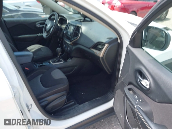 2015 Jeep Cherokee Sport with VIN 1C4PJLAB2FW566132, listed as a IAAI auction lot 42103012 with 138,016 mi miles. Bid and sale history available at carsss.com. Image 5.