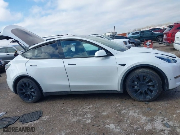 2022 Tesla Model Y Long Range with VIN 7SAYGAEEXNF505144, listed as a IAAI auction lot 41419115 with NaN miles. Bid and sale history available at carsss.com. Image 12.