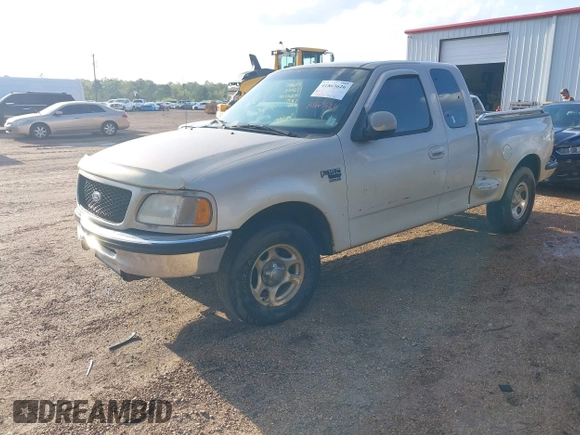 1998 Ford F-150 XL with VIN 1FTRX07L1WKA76665, listed as a IAAI auction lot 41863626 with 30,654 mi miles. Bid and sale history available at carsss.com. Image 2.