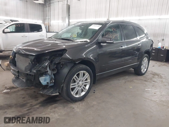 2015 Chevrolet Traverse LT with VIN 1GNKVGKD1FJ220650, listed as a IAAI auction lot 41801898 with 112,878 mi miles and . Bid and sale history available at DreamBid. Image 2.