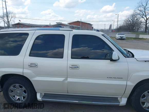 2005 Cadillac Escalade z VIN 1GYEC63T55R115387, wystawiony jako IAAI lot #41791855 z przebiegiem 165 246 mil mil oraz . Historia ofert i sprzedaży dostępna na DreamBid. Obrazek 14.