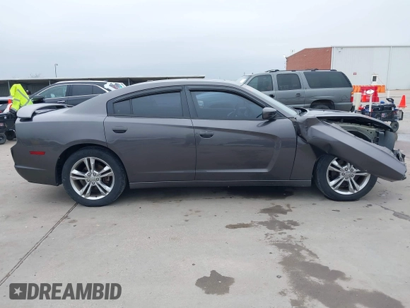 2013 Dodge Charger SXT z VIN 2C3CDXJG5DH572032, wystawiony jako IAAI lot #41707058 z przebiegiem 109 147 mil mil oraz . Historia ofert i sprzedaży dostępna na DreamBid. Obrazek 14.