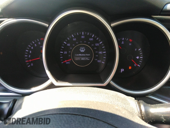 2014 Kia Optima LX with VIN 5XXGM4A70EG340051, listed as a IAAI auction lot 42048762 with 146,519 mi miles. Bid and sale history available at carsss.com. Image 7.