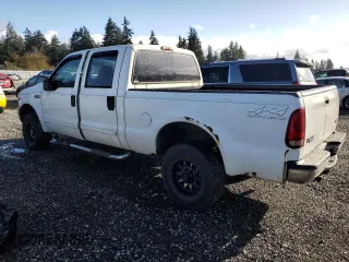 2001 Ford Super Duty F-250 XL with VIN 1FTNW21LX1EB54972, listed as a Copart auction lot 78745114 with 239,449 mi miles and Clean Title. Bid and sale history available at carsss.com. Image 2.