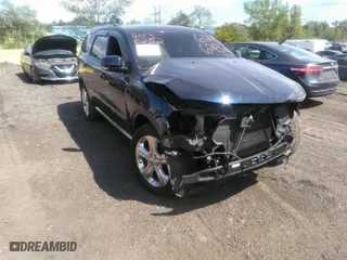 2014 Dodge Durango Limited with VIN 1C4RDJDG3EC585865, listed as a IAAI auction lot 40136282 with 68,046 mi miles. Bid and sale history available at carsss.com. Image 1.