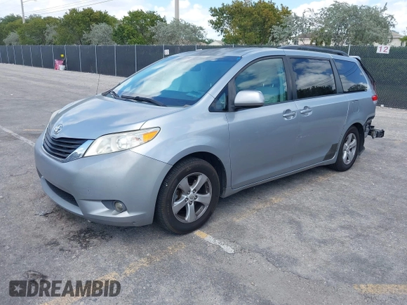 2013 Toyota Sienna LE AAS with VIN 5TDKK3DC4DS399295, listed as a IAAI auction lot 42173970 with 128,350 mi miles and . Bid and sale history available at DreamBid. Image 2.