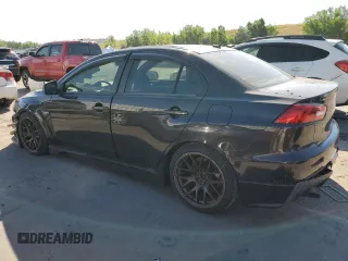 2008 Mitsubishi Lancer Evolution GSR with VIN JA3AW86V58U049914, listed as a Copart auction lot 62105824 with 129,622 mi miles and Salvage Title. Bid and sale history available at carsss.com. Image 2.