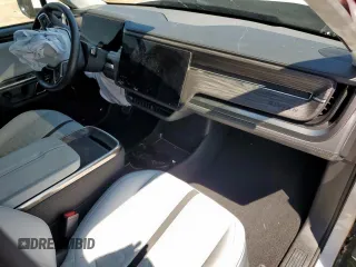 2023 Rivian R1S Launch Edition z VIN 7PDSGABL9PN010792, wystawiony jako Copart lot #56359465 z przebiegiem 24 319 mil mil oraz Szkoda całkowita • Salvage title. Historia ofert i sprzedaży dostępna na DreamBid. Obrazek 8.